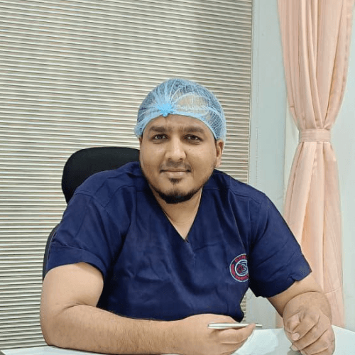 Dr. Qasim Khan in surgical attire - Consultant Surgeon at GHC Hospitals Mumbra, Thane